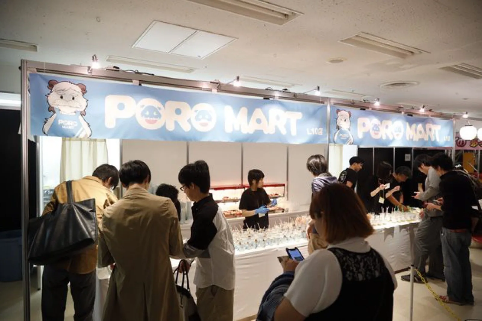 Visitors at the 'Poro Mart' food stall at the Japan office's festival-themed League of Legends anniversary event